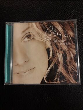 Celine Dion- Beige Cover with Turquoise Spine CD
